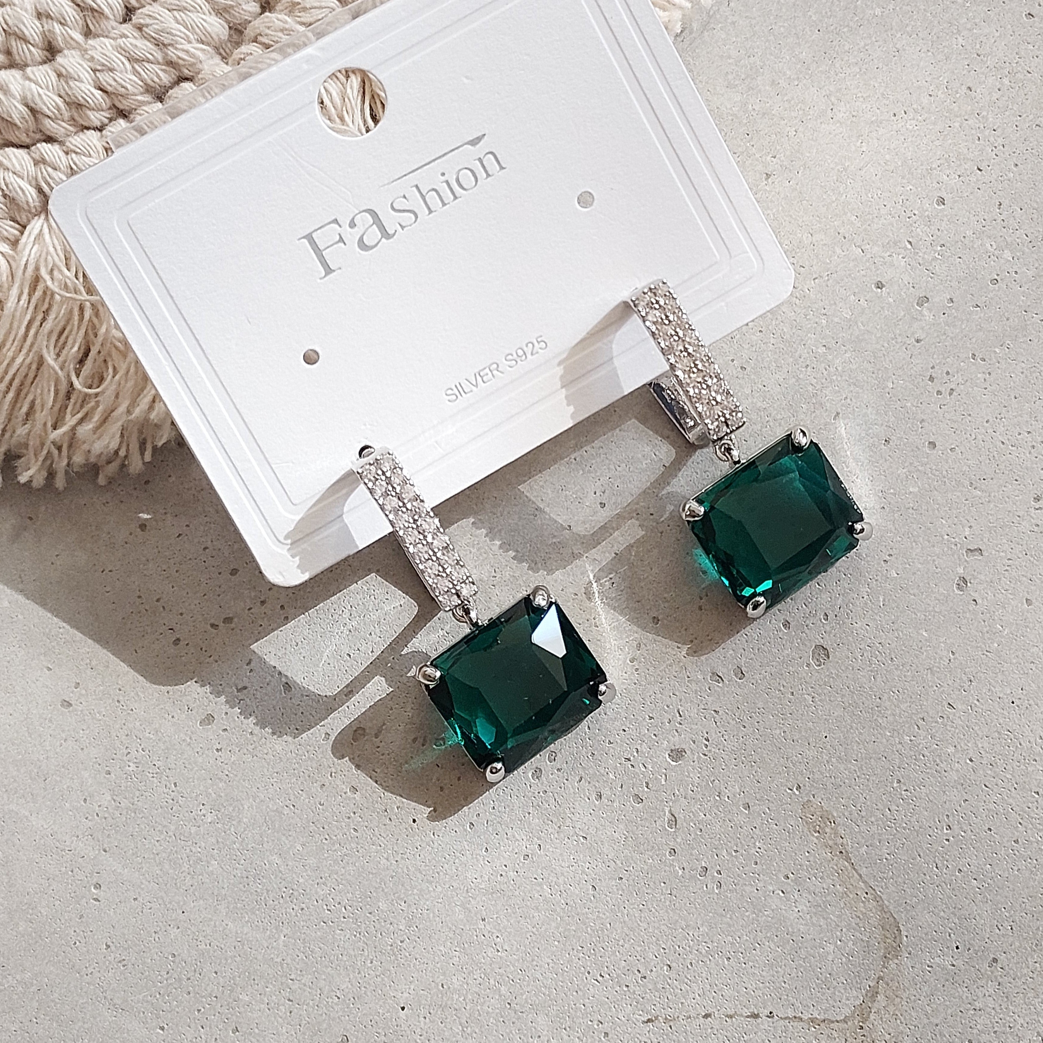 Elegant emerald green earrings for women—ISHI New York fashion accessory