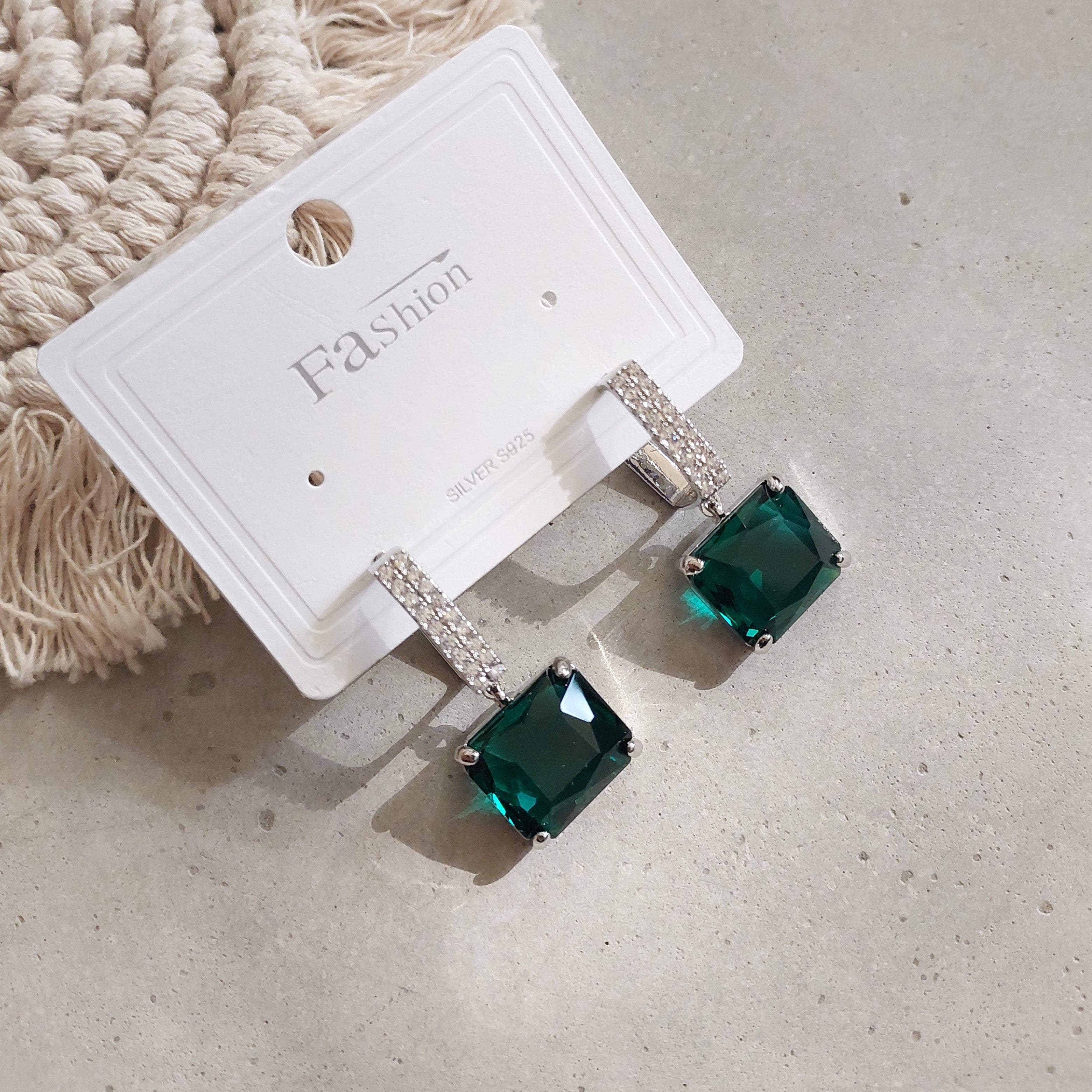 Designer green CZ earrings—gold-plated sparkle earrings, India