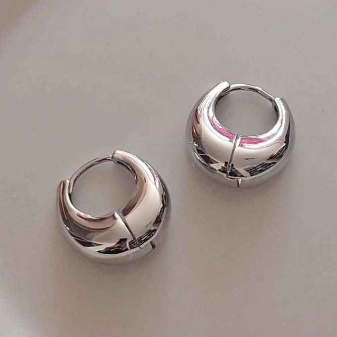 Gold crescent earrings for women—sculpted modern design by ISHI New York