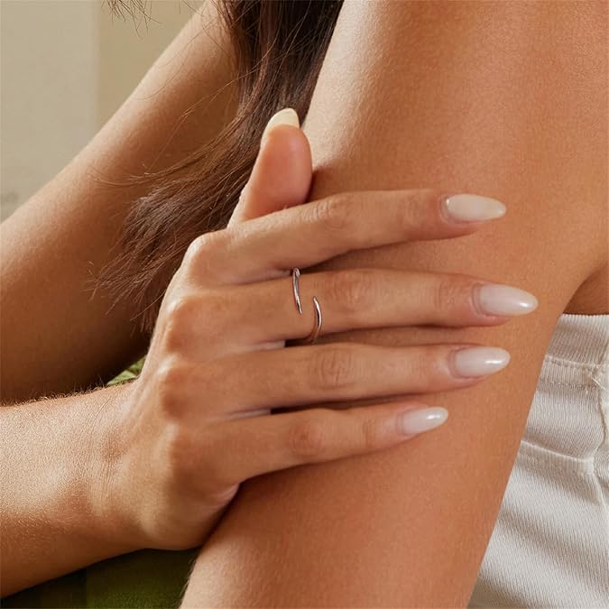 Elegant plain silver ring, perfect for stacking or solo wear.