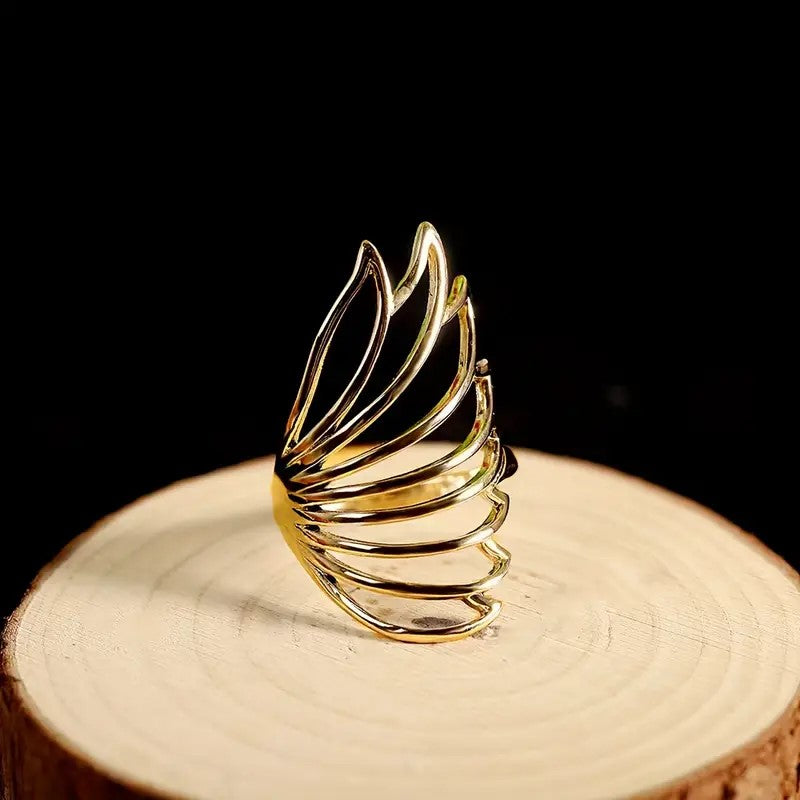 Gold ring with wing design—symbolic jewelry for women in India