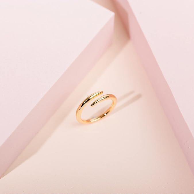 Simple gold-plated ring with a sleek, minimalist band design.