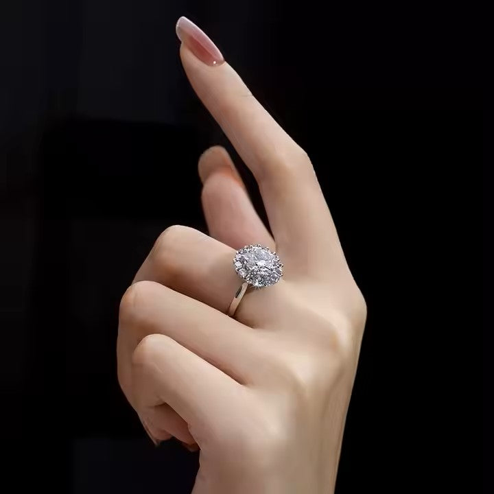 Close-up of silver round crystal ring featuring a round-cut cubic zirconia.