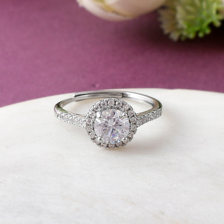 Promise Ring featuring a sparkling Cubic Zirconia, set in rhodium plating for a timeless, elegant shine.