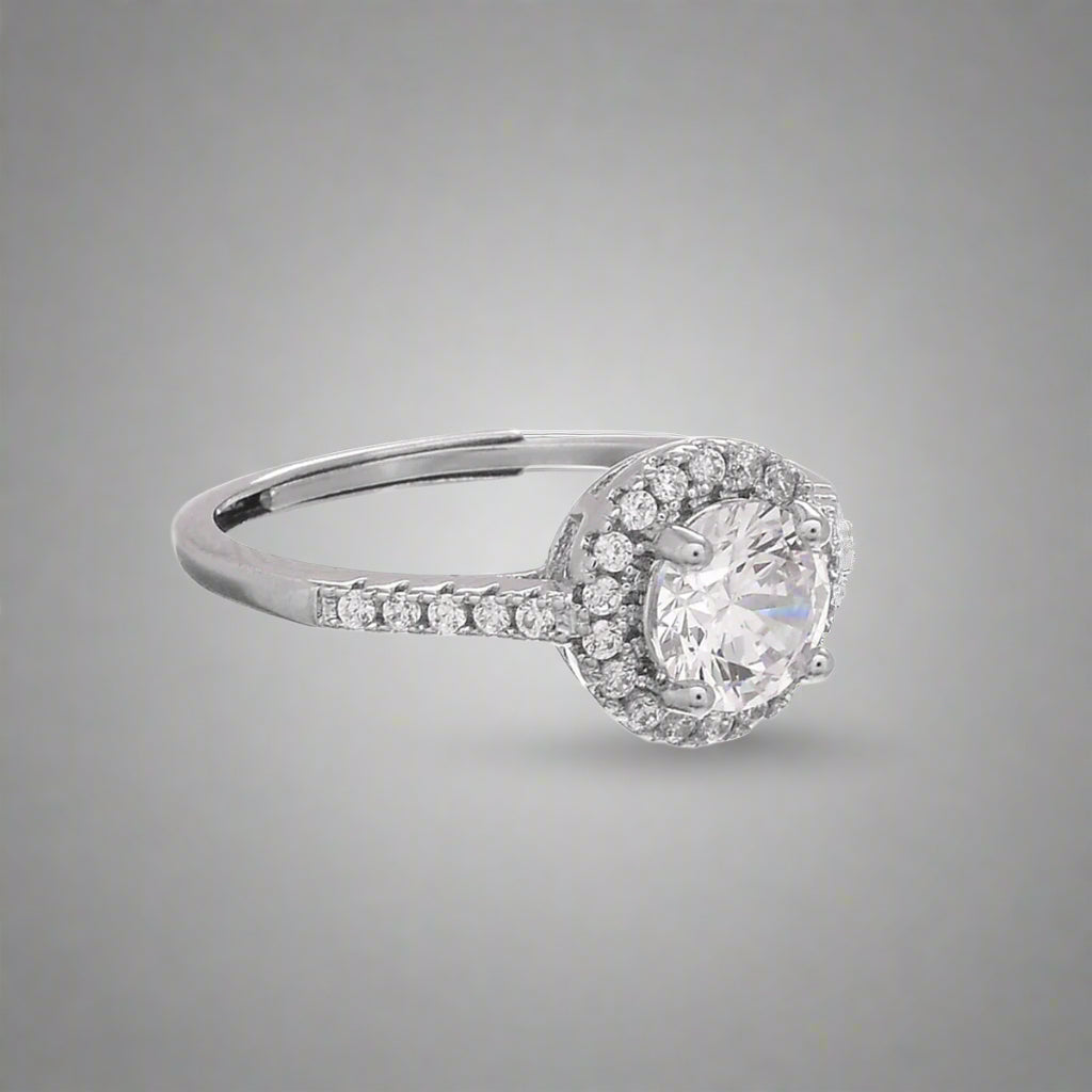 Promise Ring with a sparkling CZ and rhodium plating for a timeless, elegant look.