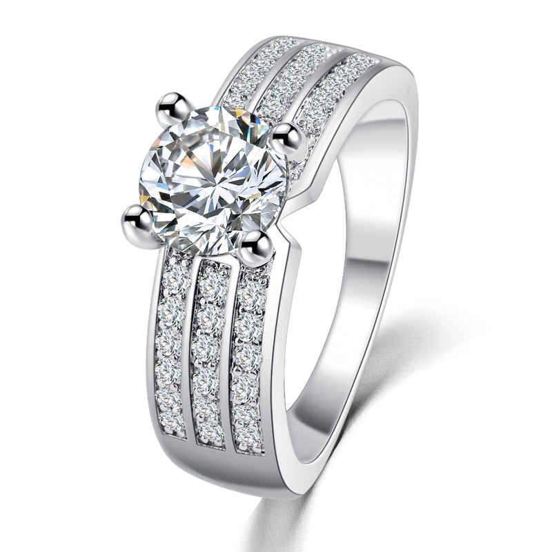 Elegant Classic CZ Ring featuring a radiant Cubic Zirconia, rhodium-plated band, and sleek design - ISHI New York for modern style.