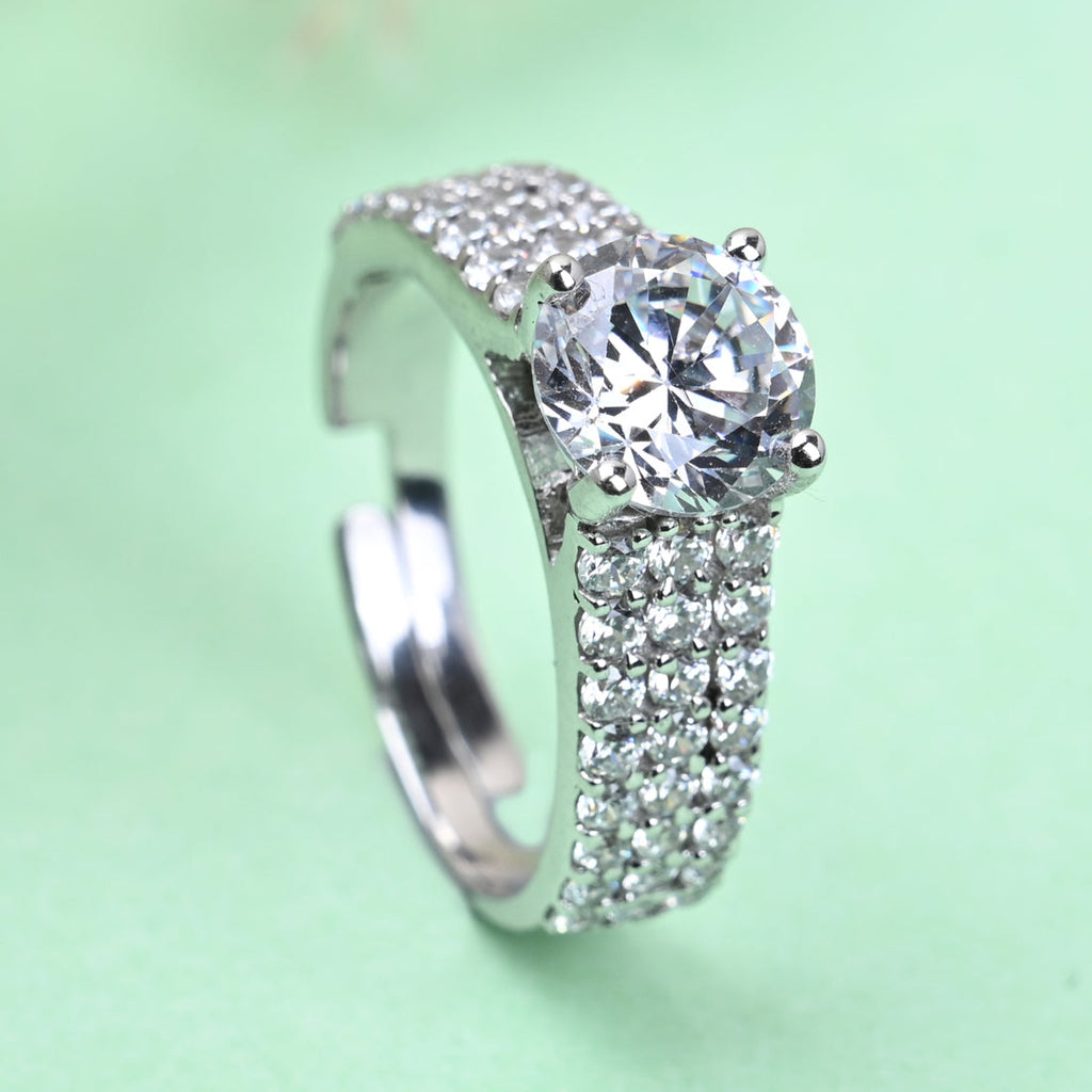 Classic CZ Ring with rhodium plating and a round-cut cubic zirconia center.