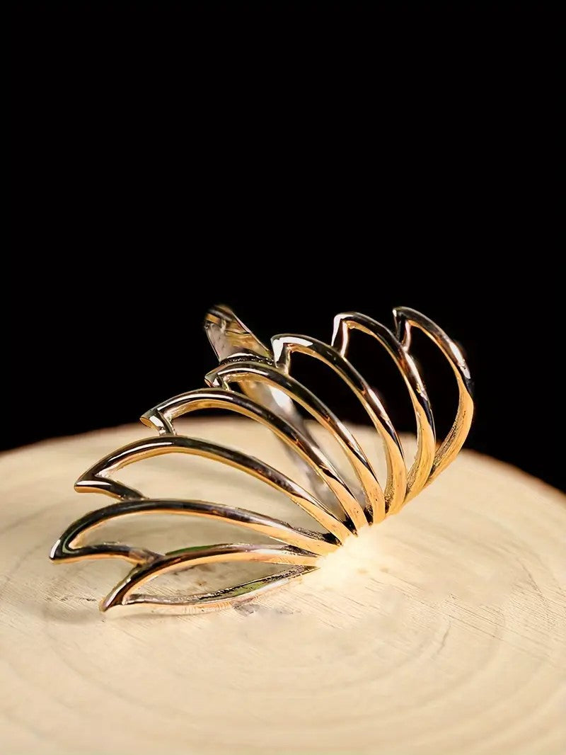 Wing-shaped ring in gold finish—stylish and meaningful accessory