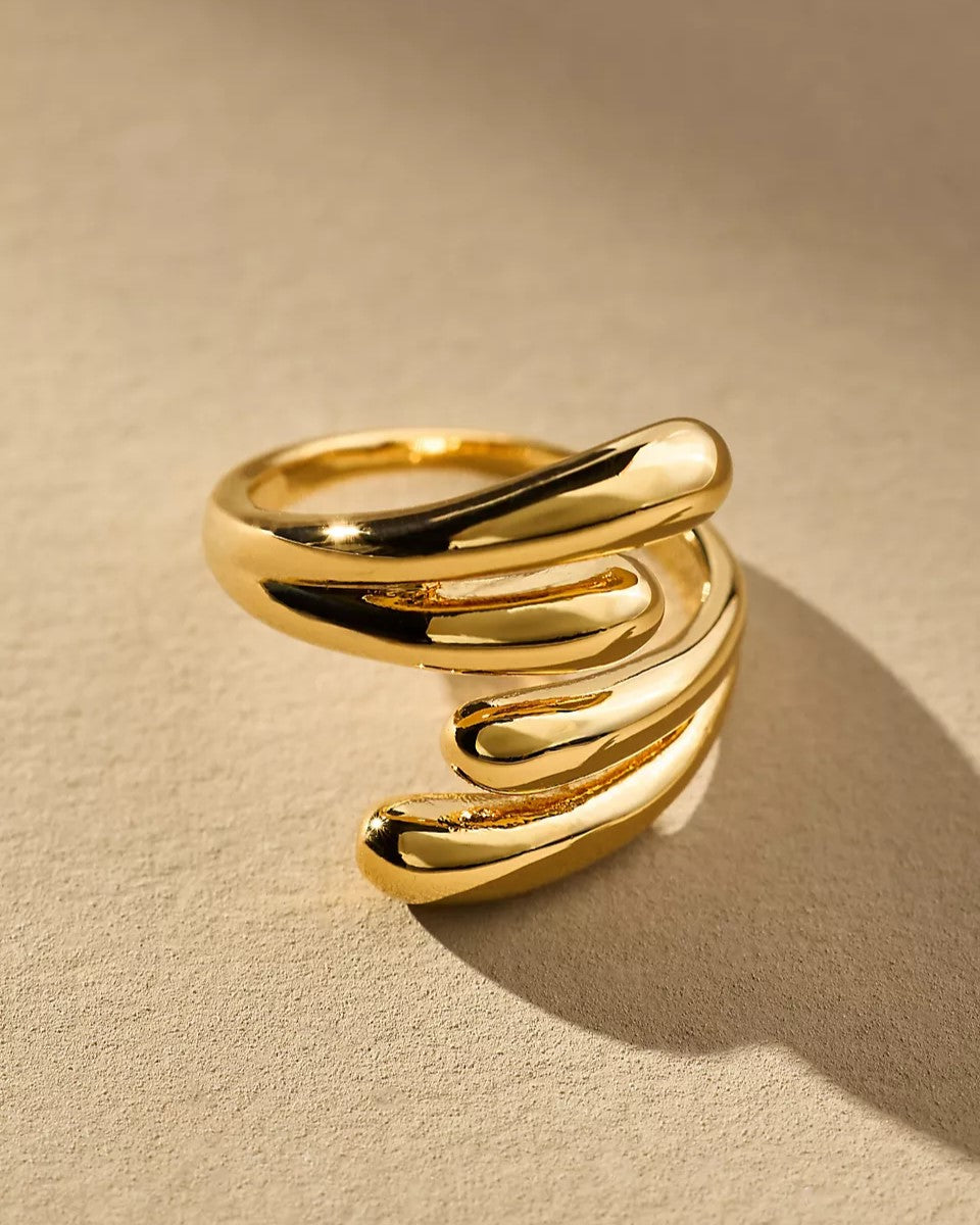 Affinity Ring with rhodium plating and intertwined design accented with cubic zirconia.