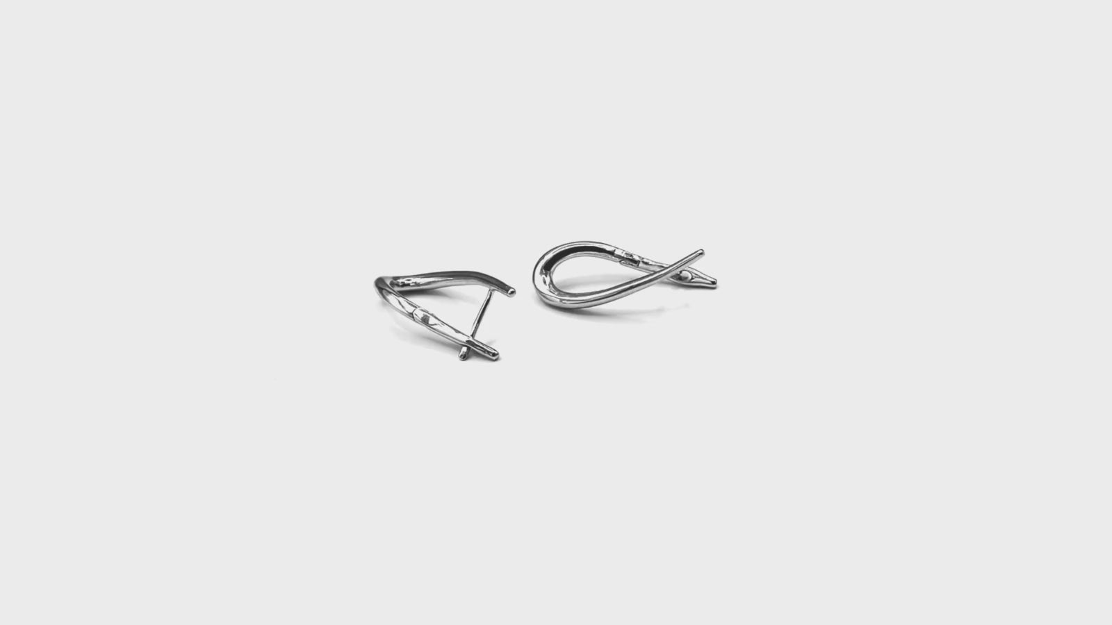 Rhodium-plated Teardrop Hoop Earrings, demi-fine jewelry with a sleek and timeless design, hypoallergenic & anti-tarnish.