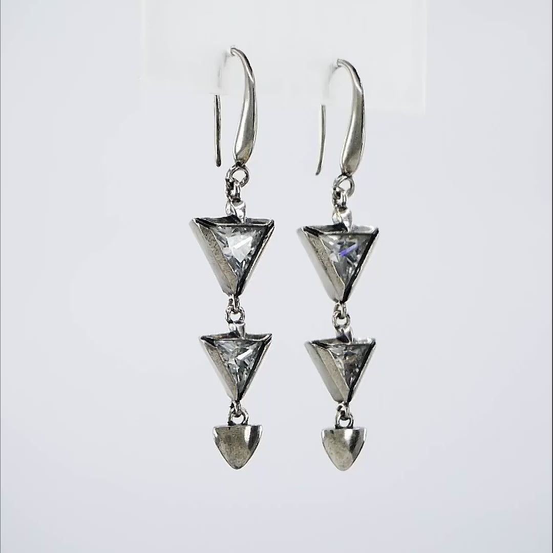 Elegant rhodium-plated Trinity Dangles Earrings, hypoallergenic and anti-tarnish.