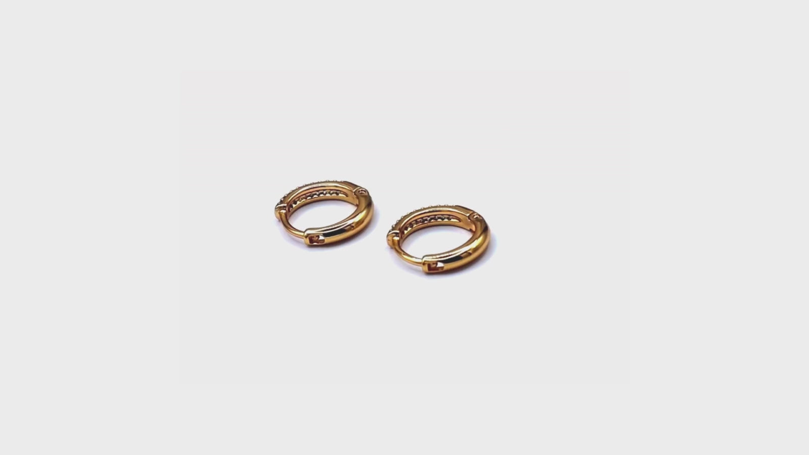 Rose gold-plated hoop earrings with a sleek, timeless design, offering a hypoallergenic and anti-tarnish finish for lasting elegance.