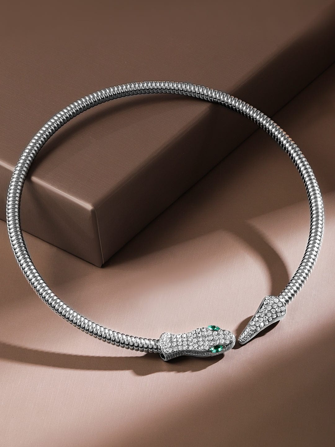 Cubic zirconia-encrusted snake choker in polished silver finish.